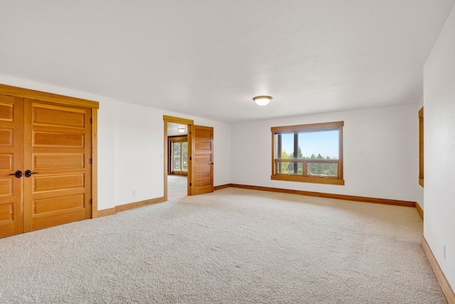 629 Alvista Loop, Hamilton, MT 59840 - unfurnished room featuring baseboards and light colored carpet