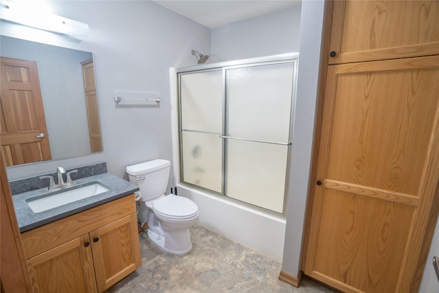 3185 Hubbart Dam Rd, Marion, MT 59925 - full bathroom with vanity, toilet, and enclosed tub / shower combo