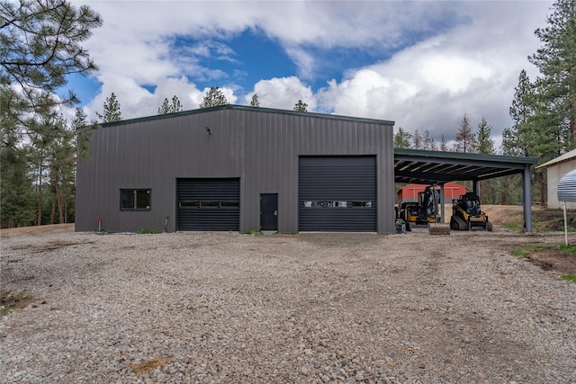 3185 Hubbart Dam Rd, Marion, MT 59925 - garage featuring a detached garage and driveway