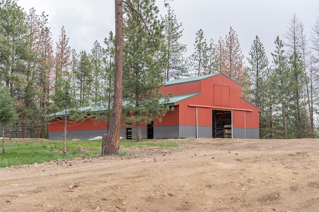 3185 Hubbart Dam Rd, Marion, MT 59925 - view of pole building featuring driveway