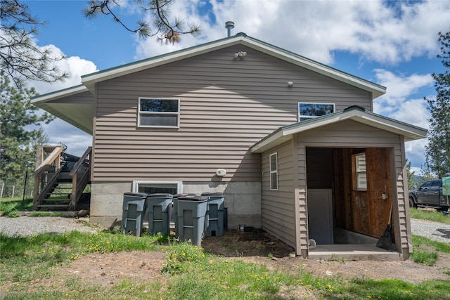 3185 Hubbart Dam Rd, Marion, MT 59925 - rear view of property featuring a wooden deck