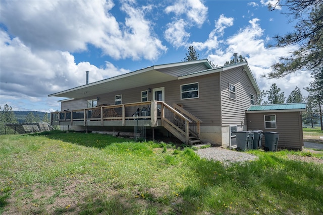 3185 Hubbart Dam Rd, Marion, MT 59925 - back of house featuring a wooden deck