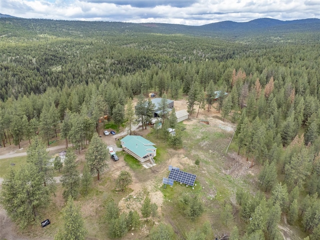3185 Hubbart Dam Rd, Marion, MT 59925 - aerial view of property's location with a heavily wooded area and a mountainous background