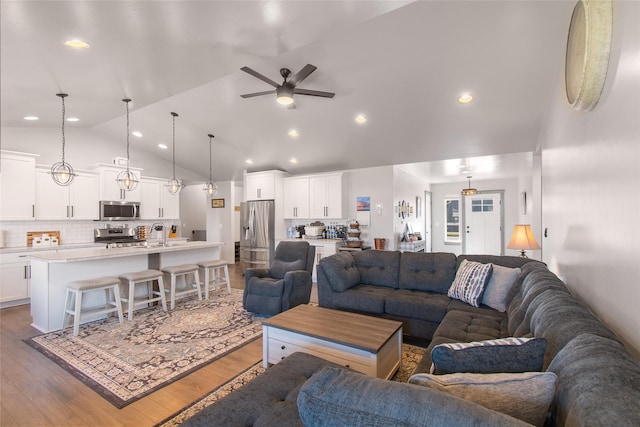 3870 Swan Rd, East Helena, MT 59635 - living room with a ceiling fan, wood finished floors, high vaulted ceiling, and recessed lighting