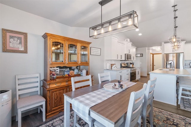 3870 Swan Rd, East Helena, MT 59635 - dining space with wood finished floors and vaulted ceiling