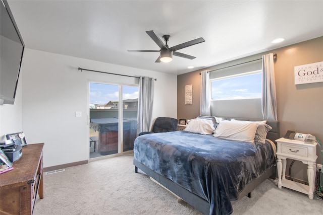 3870 Swan Rd, East Helena, MT 59635 - carpeted bedroom with access to exterior, ceiling fan, recessed lighting, and baseboards