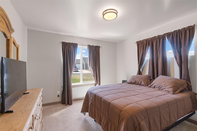3870 Swan Rd, East Helena, MT 59635 - bedroom featuring light carpet and baseboards