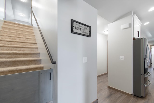 3870 Swan Rd, East Helena, MT 59635 - stairway featuring wood finished floors and baseboards