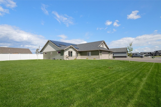 3870 Swan Rd, East Helena, MT 59635 - single story home featuring asphalt driveway, solar panels, and a garage