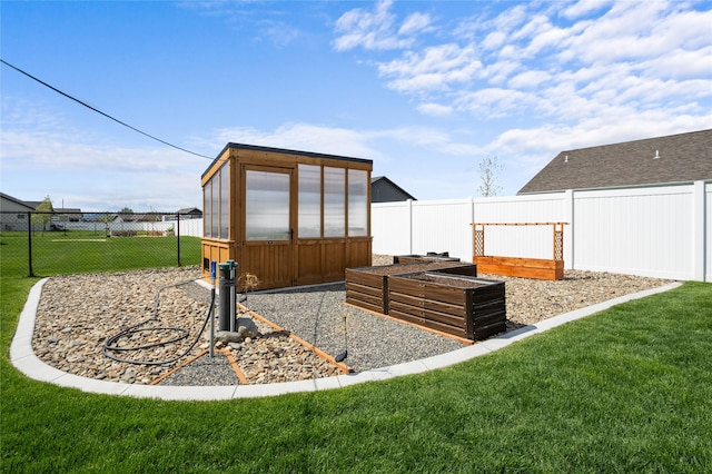 3870 Swan Rd, East Helena, MT 59635 - view of greenhouse featuring a vegetable garden