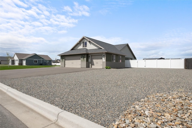 3870 Swan Rd, East Helena, MT 59635 - view of front facade featuring concrete driveway and a garage