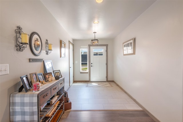 3870 Swan Rd, East Helena, MT 59635 - foyer featuring baseboards and light wood-type flooring
