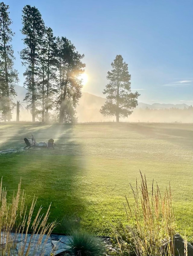 27 Elk Meadow Ln, Kalispell, MT 59901 - view of green lawn featuring a mountain view
