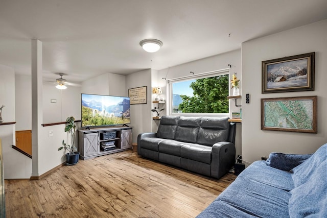 5 Darlene Rd, Columbia Falls, MT 59912 - living room with wood finished floors, a ceiling fan, and baseboards