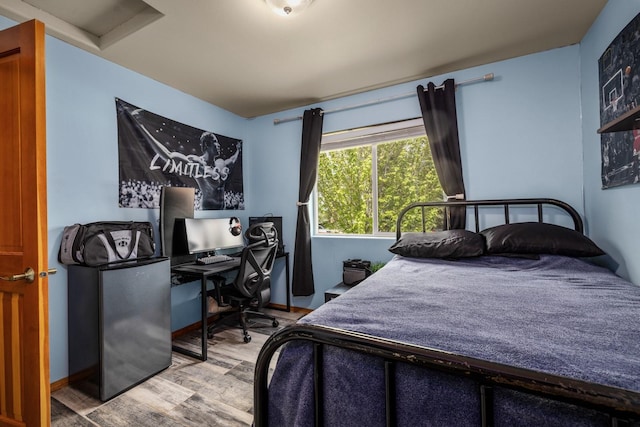 5 Darlene Rd, Columbia Falls, MT 59912 - bedroom with wood finished floors and a desk