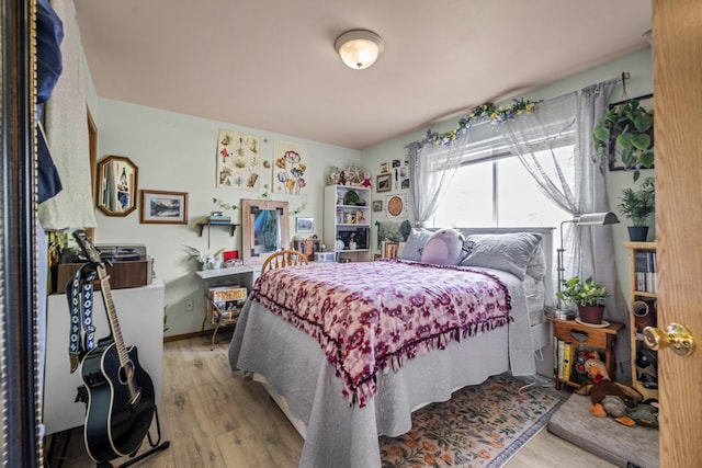 5 Darlene Rd, Columbia Falls, MT 59912 - bedroom featuring wood finished floors and baseboards