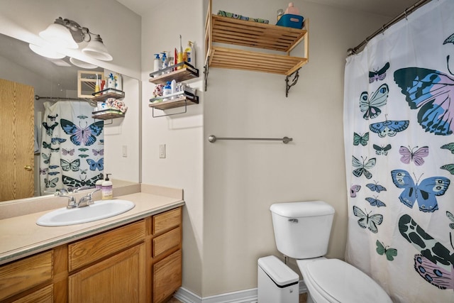 5 Darlene Rd, Columbia Falls, MT 59912 - full bathroom with toilet, vanity, and a shower with curtain