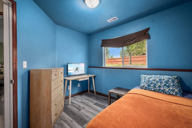 5 Darlene Rd, Columbia Falls, MT 59912 - bedroom with wood finished floors, an office area, and baseboards