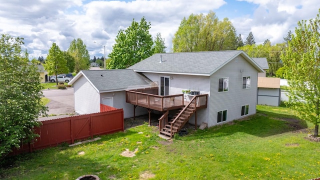 5 Darlene Rd, Columbia Falls, MT 59912 - back of house featuring stairs, a wooden deck, and roof with shingles