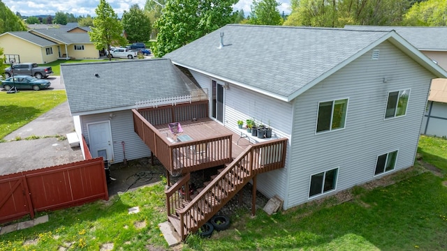 5 Darlene Rd, Columbia Falls, MT 59912 - rear view of house featuring a deck, roof with shingles, stairway, and a residential view