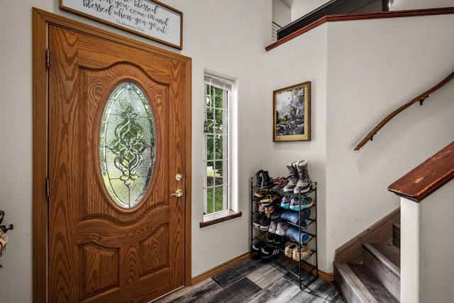 5 Darlene Rd, Columbia Falls, MT 59912 - foyer entrance featuring stairway, baseboards, and dark wood-style flooring