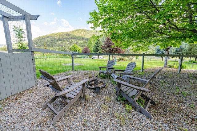 11537 Mt Highway 37 N, Libby, MT 59923 - view of yard with a fire pit and a mountain view