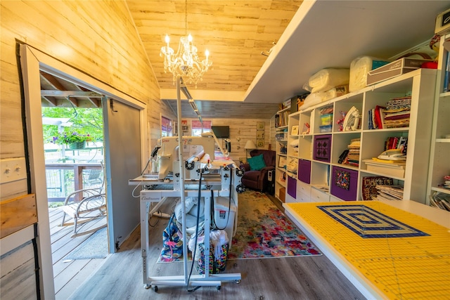 11537 Mt Highway 37 N, Libby, MT 59923 - game room with wood finished floors, vaulted ceiling, wood ceiling, wood walls, and a chandelier