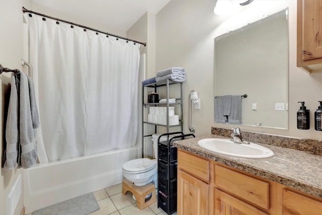 4100 Mullan Rd Unit 102, Missoula, MT 59808 - bathroom featuring vanity, toilet, shower / tub combo with curtain, and tile patterned flooring
