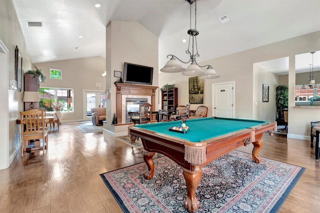4100 Mullan Rd Unit 102, Missoula, MT 59808 - recreation room featuring high vaulted ceiling, pool table, light wood-style floors, and a multi sided fireplace