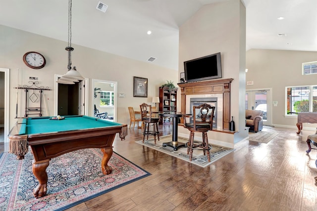 4100 Mullan Rd Unit 102, Missoula, MT 59808 - game room featuring high vaulted ceiling, pool table, baseboards, wood finished floors, and a fireplace with raised hearth