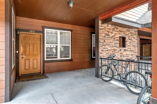 4100 Mullan Rd Unit 102, Missoula, MT 59808 - property entrance with covered porch and stone siding