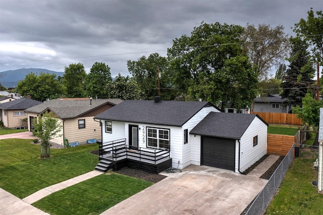 2929 Sunrise Promenade Promenade, Missoula, MT 59801 - view of front of home featuring roof with shingles, an attached garage, concrete driveway, and a mountain view