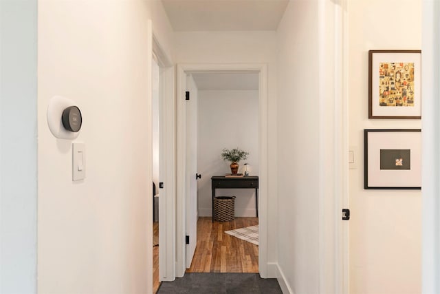 2929 Sunrise Promenade Promenade, Missoula, MT 59801 - hallway with baseboards and dark wood-style floors