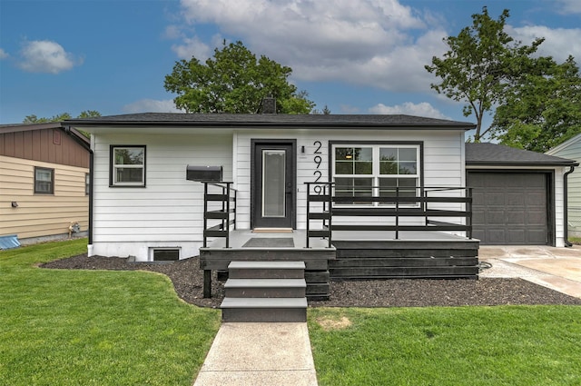 2929 Sunrise Promenade Promenade, Missoula, MT 59801 - view of front of home with a garage, a front yard, and driveway