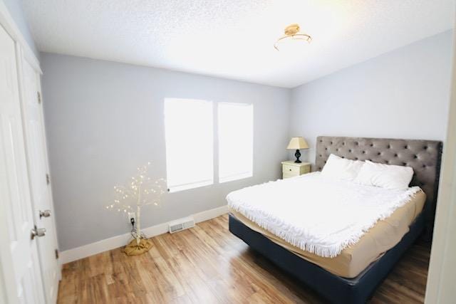 4757 Richlie, Missoula, MT 59808 - bedroom with baseboards and wood finished floors