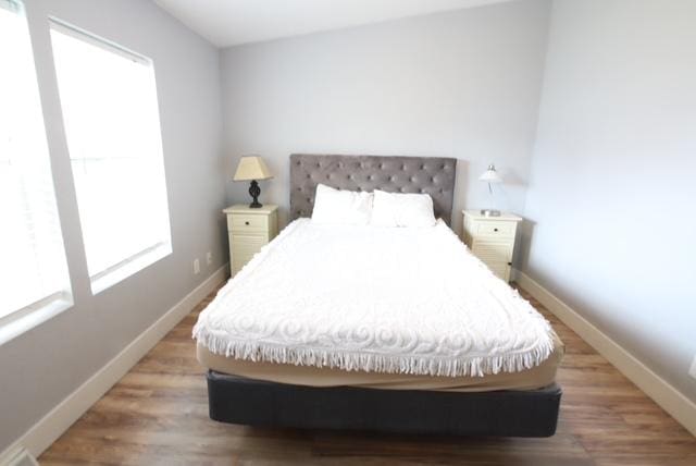 4757 Richlie, Missoula, MT 59808 - bedroom with baseboards and light wood-type flooring