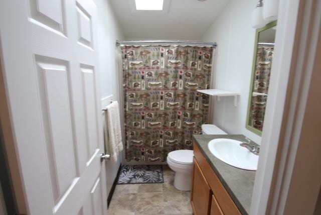4757 Richlie, Missoula, MT 59808 - bathroom featuring vanity, toilet, and a shower with curtain