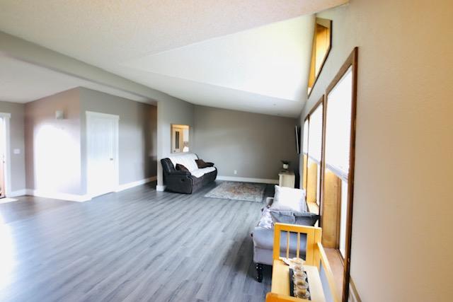4757 Richlie, Missoula, MT 59808 - living area with wood finished floors and baseboards