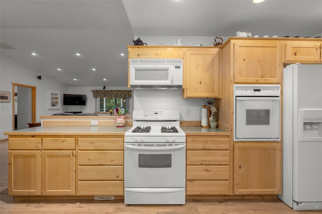 13033 Trinkus Ln, Bigfork, MT 59911 - kitchen featuring white appliances, light brown cabinetry, light wood-style floors, recessed lighting, and a peninsula