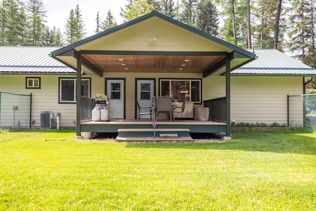 13033 Trinkus Ln, Bigfork, MT 59911 - back of house with central AC and metal roof