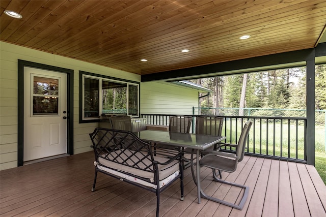 13033 Trinkus Ln, Bigfork, MT 59911 - wooden terrace with outdoor dining area