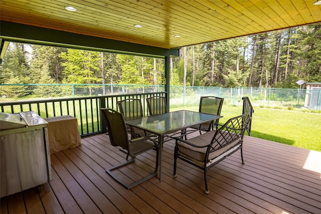 13033 Trinkus Ln, Bigfork, MT 59911 - wooden terrace featuring outdoor dining area