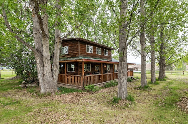 874 Coal Pit Rd, Corvallis, MT 59828 - rear view of property featuring a porch