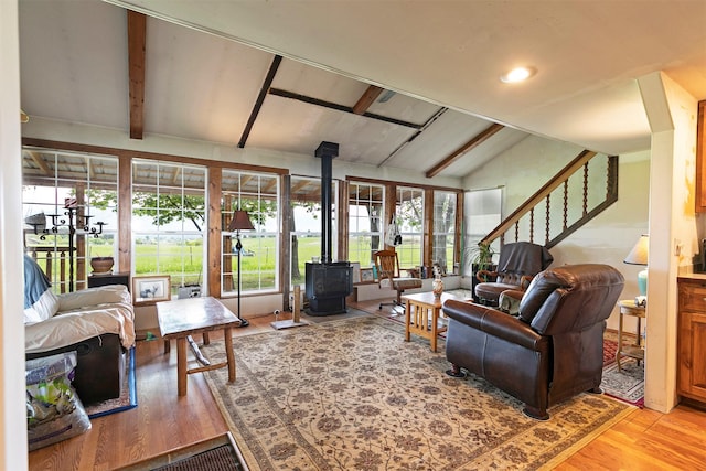 874 Coal Pit Rd, Corvallis, MT 59828 - living area with a wood stove and wood finished floors
