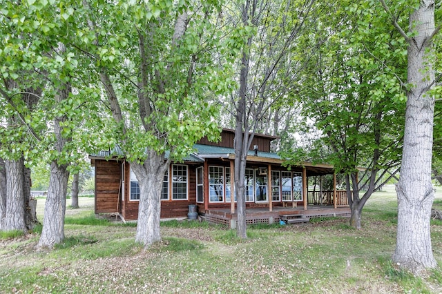 874 Coal Pit Rd, Corvallis, MT 59828 - view of property hidden behind natural elements with covered porch and metal roof