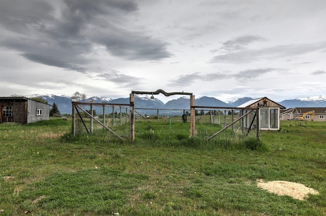 874 Coal Pit Rd, Corvallis, MT 59828 - view of yard with a mountain view