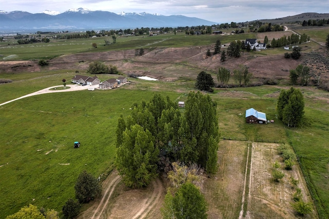 874 Coal Pit Rd, Corvallis, MT 59828 - view of property location featuring rural landscape, a mountainous background, and agricultural land