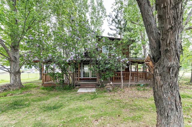 874 Coal Pit Rd, Corvallis, MT 59828 - rear view of house with a yard