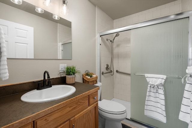 28 Bethany St, Columbia Falls, MT 59912 - full bath with tiled shower, vanity, and toilet