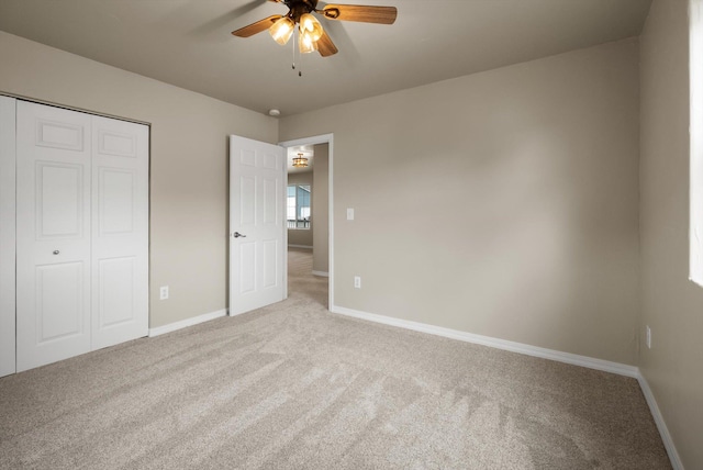 28 Bethany St, Columbia Falls, MT 59912 - unfurnished bedroom with light colored carpet, baseboards, and a closet